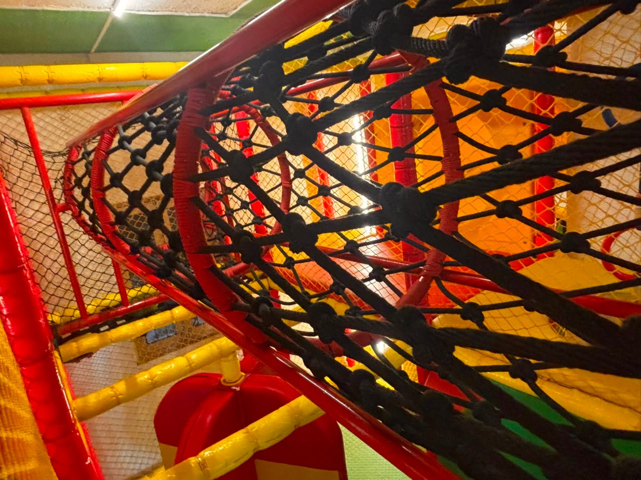 A rope tunnel inside the Happy Kydz play area