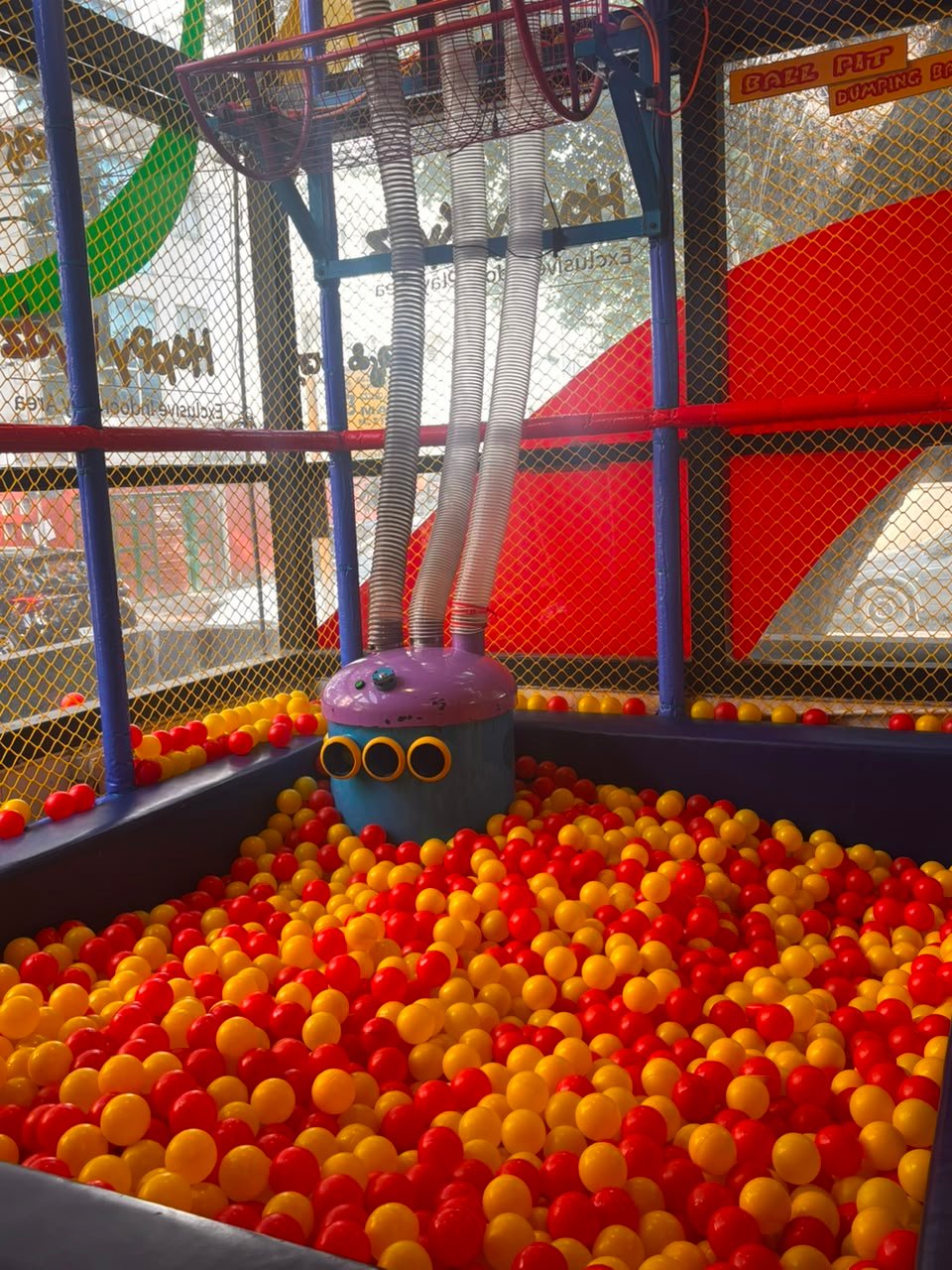 A colourful ball pit inside Happy Kydz